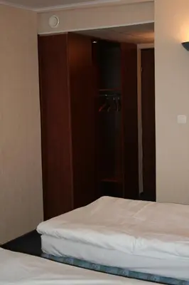 Łóżko lub łóżka w pokoju w obiekcie Hotel TenisHouse