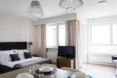 Łóżko lub łóżka w pokoju w obiekcie LuxLux Apartments Coconut