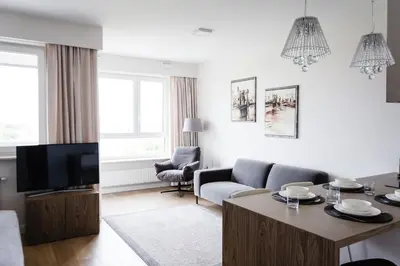 Telewizja i/lub zestaw kina domowego w obiekcie LuxLux Apartments Coconut