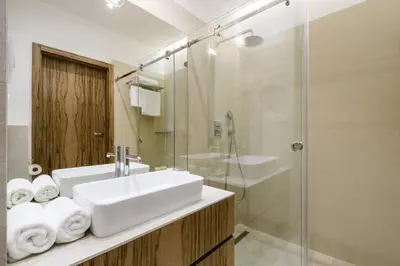 Łazienka w obiekcie LuxLux Apartments Afara