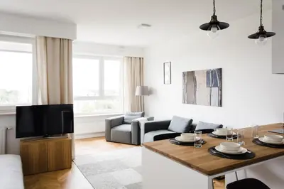 Telewizja i/lub zestaw kina domowego w obiekcie LuxLux Apartments Silver Dove