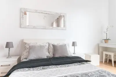 Łóżko lub łóżka w pokoju w obiekcie Apartamenty Trzy Wieze