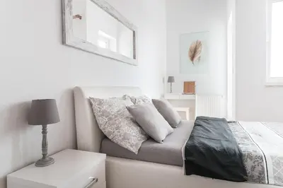 Łóżko lub łóżka w pokoju w obiekcie Apartamenty Trzy Wieze
