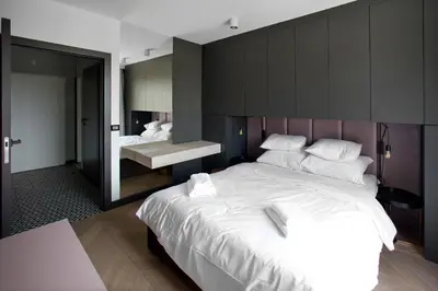 Łóżko lub łóżka w pokoju w obiekcie P&O Serviced Apartments SOHO FACTORY