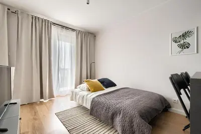 Łóżko lub łóżka w pokoju w obiekcie P&O Serviced Apartments SOHO FACTORY