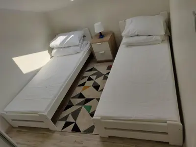 Łóżko lub łóżka w pokoju w obiekcie 601 Apartments