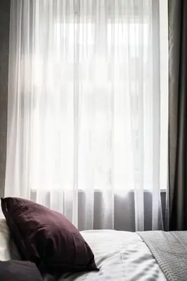 Łóżko lub łóżka w pokoju w obiekcie oompH Koszyki Luxurious Apartments