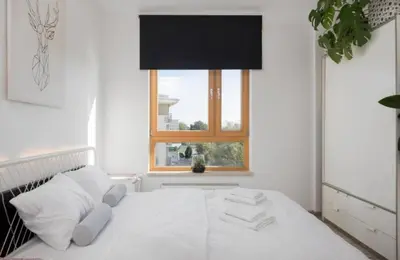 Łóżko lub łóżka w pokoju w obiekcie Shiraz Trio Apartament