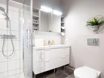 Łazienka w obiekcie WHITE RESIDENCE 4rooms - CITY CENTER