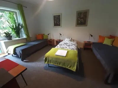 Łóżko lub łóżka w pokoju w obiekcie Animrumru