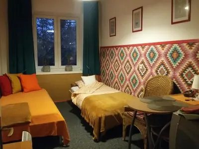 Łóżko lub łóżka w pokoju w obiekcie Animrumru