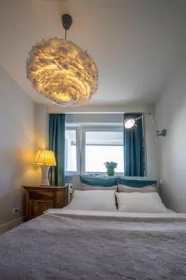 Łóżko lub łóżka w pokoju w obiekcie Apartament Świętokrzyska