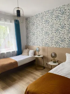 Łóżko lub łóżka w pokoju w obiekcie Villa Lulu