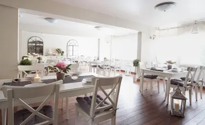 Restauracja lub miejsce do jedzenia w obiekcie Obiekt Hotelarski Patron