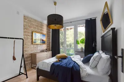 Łóżko lub łóżka w pokoju w obiekcie ShortStayPoland Ciasna (B43)