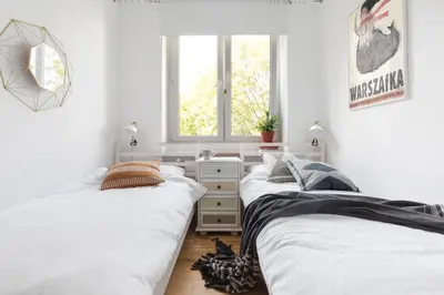 Łóżko lub łóżka w pokoju w obiekcie ShortStayPoland Ciasna (B43)