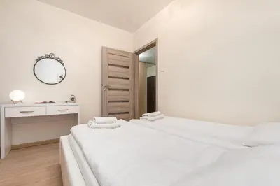 Łóżko lub łóżka w pokoju w obiekcie Al Krakowska 291A by Homeprime