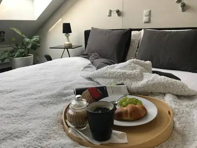 Łóżko lub łóżka w pokoju w obiekcie Apartament 