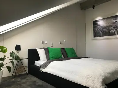 Łóżko lub łóżka w pokoju w obiekcie Apartament 