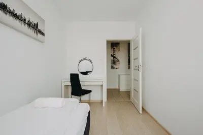 Łóżko lub łóżka w pokoju w obiekcie ShortStayPoland Krakowska (B65)