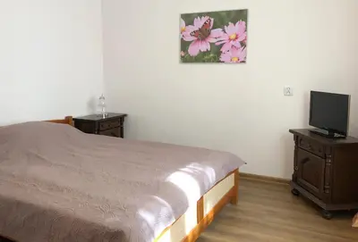 Łóżko lub łóżka w pokoju w obiekcie Pulawska Nr 1