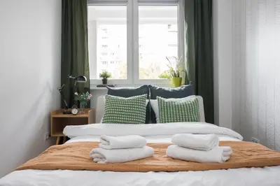 Łóżko lub łóżka w pokoju w obiekcie ★Bright apartment with positive vibes★