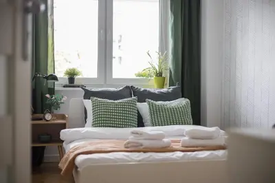 Łóżko lub łóżka w pokoju w obiekcie ★Bright apartment with positive vibes★