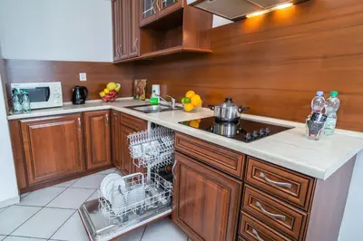 Kuchnia lub aneks kuchenny w obiekcie Warsaw Apartments - Apartamenty Wilanów