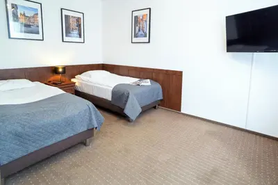Łóżko lub łóżka w pokoju w obiekcie Warsaw Apartments - Apartamenty Wilanów