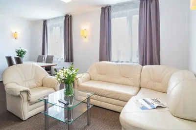 Część wypoczynkowa w obiekcie Warsaw Apartments - Apartamenty Wilanów