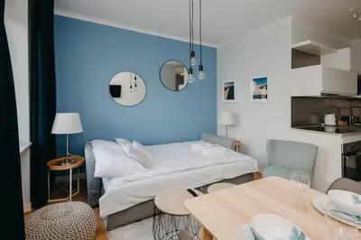 Łóżko lub łóżka w pokoju w obiekcie ShortStayPoland Aleje Jerozolimskie (B67)