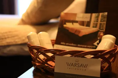 Łóżko lub łóżka w pokoju w obiekcie Apart Rooms Marszalkowska by WarsawResidence Group