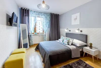 Łóżko lub łóżka w pokoju w obiekcie ClickTheFlat Sienna Center Apart Rooms