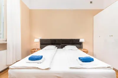Łóżko lub łóżka w pokoju w obiekcie Apartment PREMIUM Nowy Świat by Your Freedom