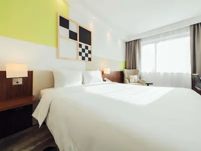 Łóżko lub łóżka w pokoju w obiekcie ibis Styles Warszawa Airport