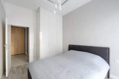 Łóżko lub łóżka w pokoju w obiekcie Exclusive Trendy Apartments