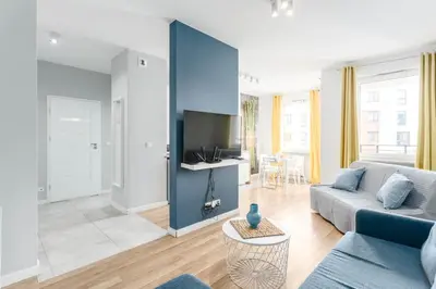 Telewizja i/lub zestaw kina domowego w obiekcie Chill Apartments Airport Ursynów