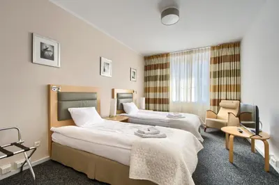 Łóżko lub łóżka w pokoju w obiekcie 404 Rooms Wilanowska
