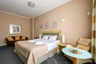 Łóżko lub łóżka w pokoju w obiekcie 404 Rooms Wilanowska