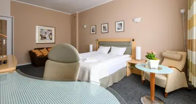 Łóżko lub łóżka w pokoju w obiekcie 404 Rooms Wilanowska