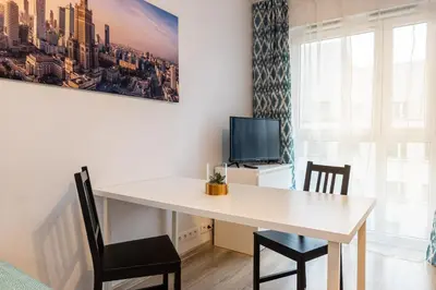 Telewizja i/lub zestaw kina domowego w obiekcie Galeria Rondo Wiatraczna Apartments