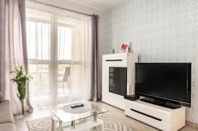 Telewizja i/lub zestaw kina domowego w obiekcie Galeria Rondo Wiatraczna Apartments