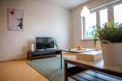 Telewizja i/lub zestaw kina domowego w obiekcie Apartament New Praga near to metro, free parking