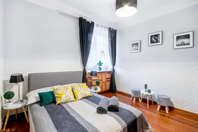 Łóżko lub łóżka w pokoju w obiekcie *ClickTheFlat* Wilcza 33 Street Apart Rooms in the City Center