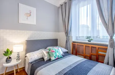 Łóżko lub łóżka w pokoju w obiekcie *ClickTheFlat* Wilcza 33 Street Apart Rooms in the City Center