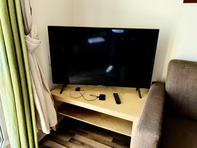 Telewizja i/lub zestaw kina domowego w obiekcie Apartments Warsaw Downtown Świętokrzyska by Noclegi Renters