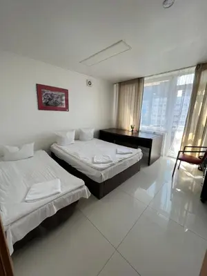 Łóżko lub łóżka w pokoju w obiekcie Marszałkowska Apartments Studio Central Warsaw