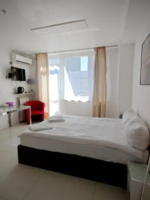 Łóżko lub łóżka w pokoju w obiekcie Marszałkowska Apartments Studio Central Warsaw