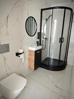Łazienka w obiekcie Marszałkowska Apartments Studio Central Warsaw