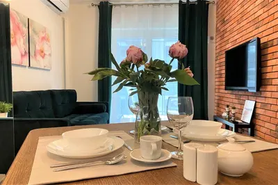 Telewizja i/lub zestaw kina domowego w obiekcie erApartments Mennica Residence